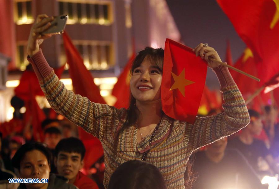 (SP)VIETNAM-FOOTBALL-AFC U23 CHAMPIONSHIP-FANS-CELEBRATION