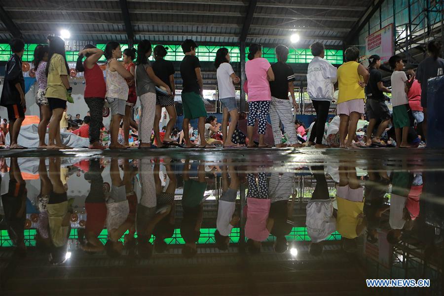 PHILIPPINES-MONSOON-RAIN-EVACUATION CENTER