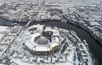 Parts of central, eastern China meet snow because of strong cold front