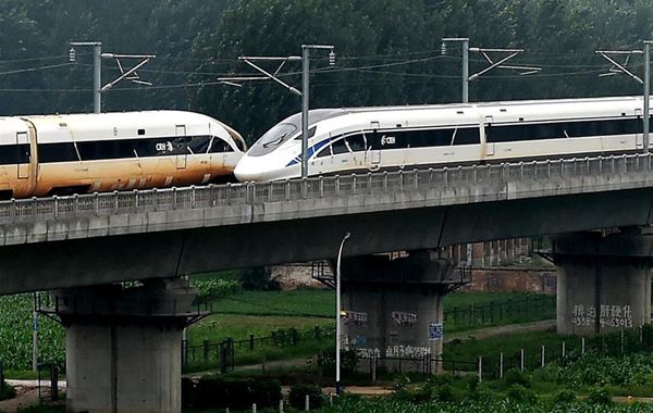 Chinese bullet trains cross in world first